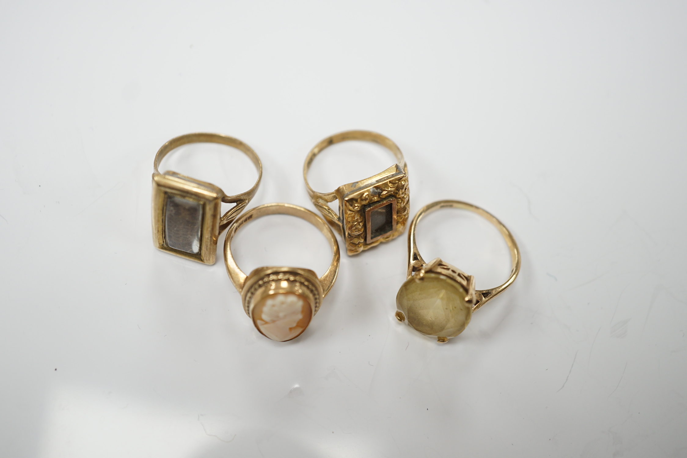 Two 19th century yellow metal mourning brooches, now with shanks converted to dress rings and two other 9ct rings.